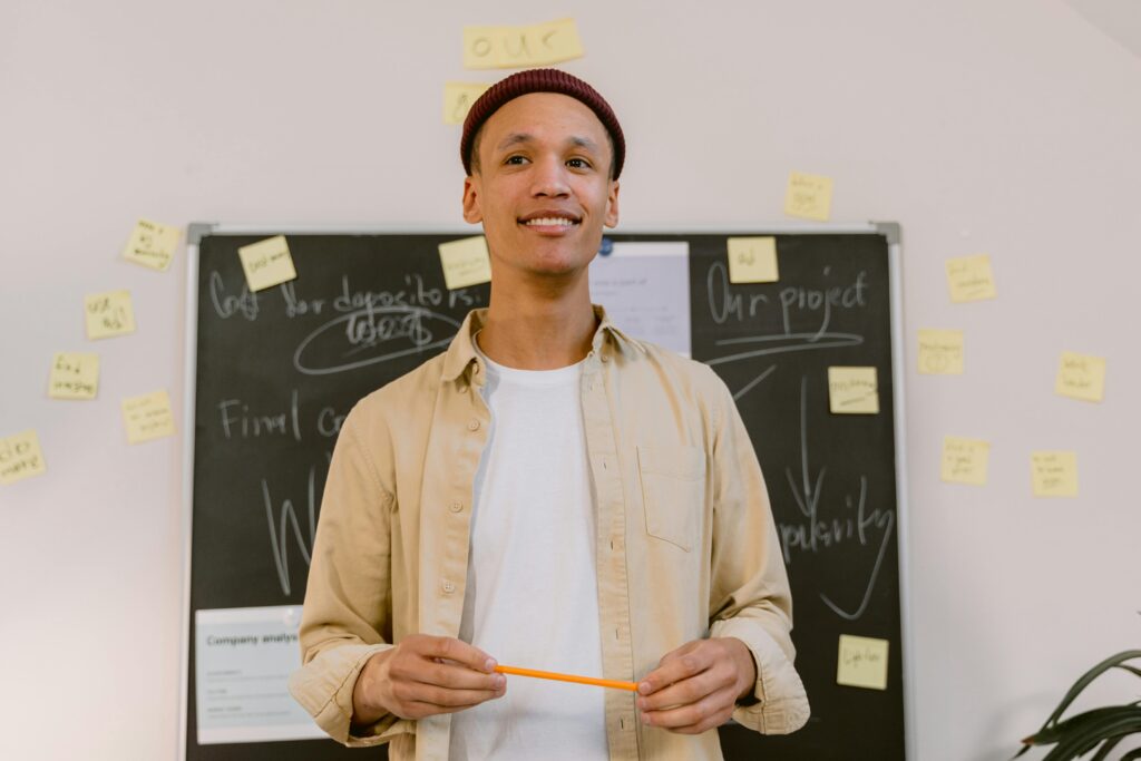 A leadership and management trainer smiling in a lecture