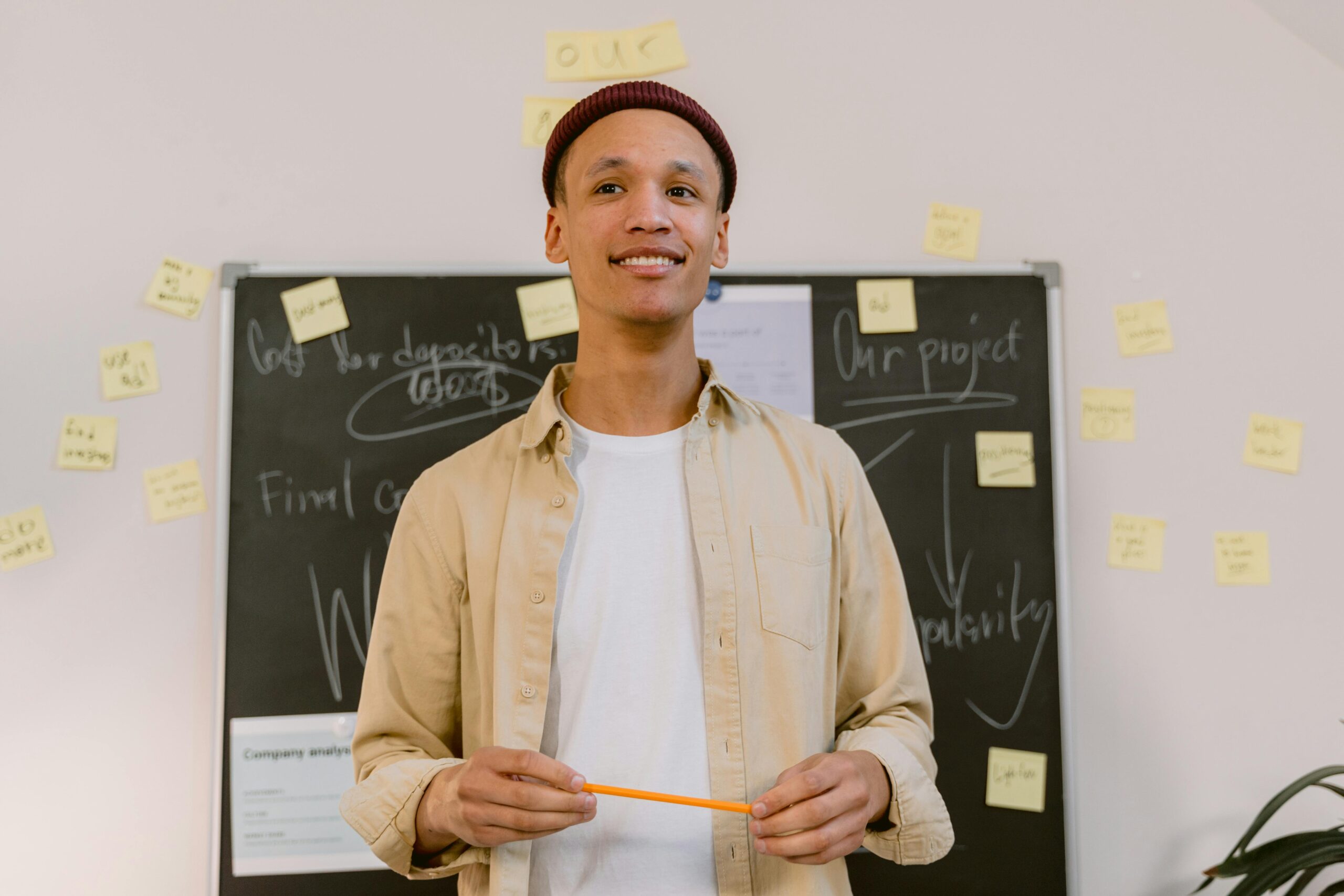 A leadership and management trainer smiling in a lecture
