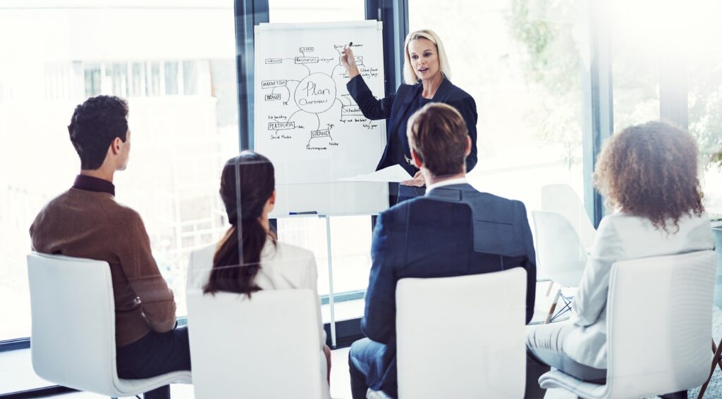 A woman teaching the right skills for sales jobs