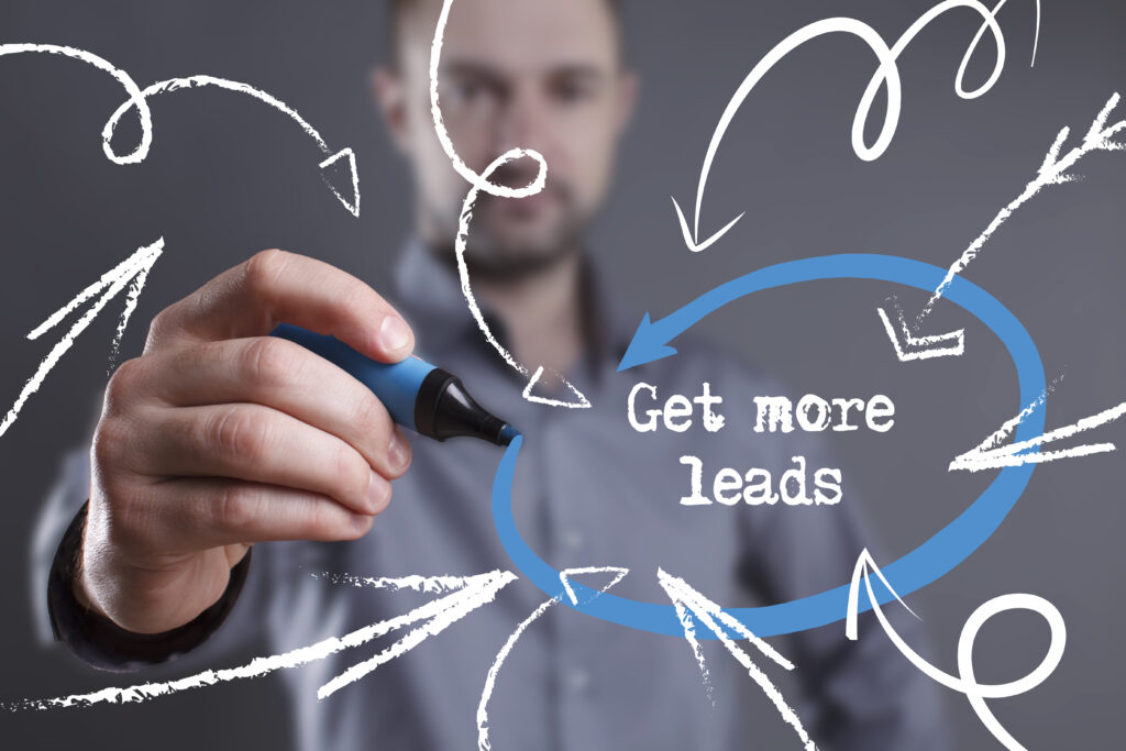 man highlighting the phrase get more leads